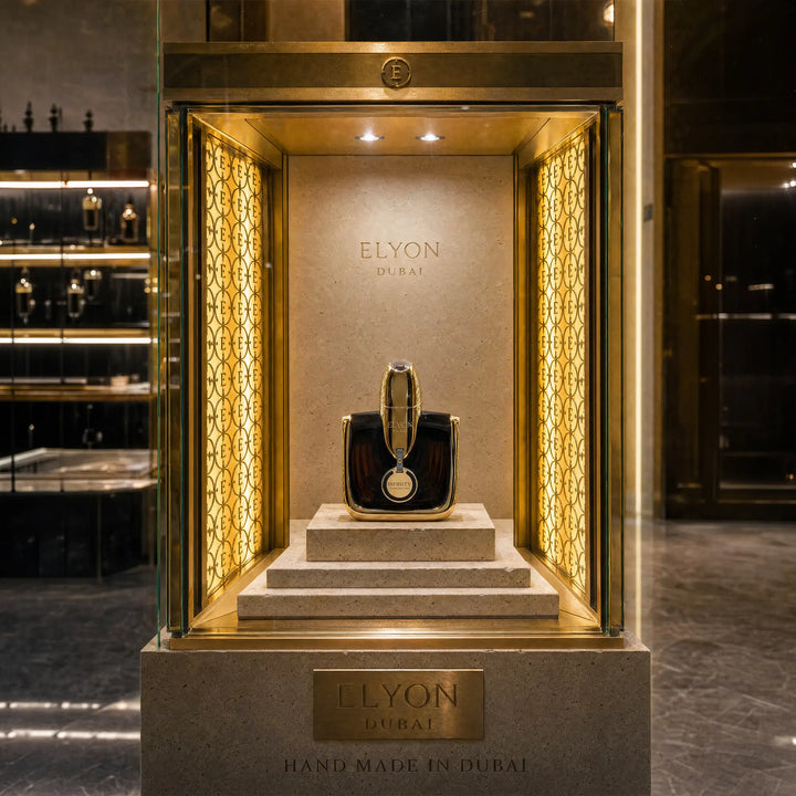 Elyon Dubai Infinity perfume bottle displayed in an illuminated vitrine